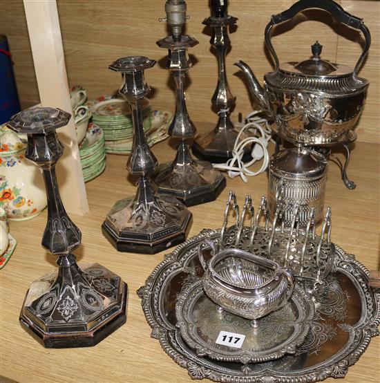 A set of four Elkington plated candlesticks, a kettle, salvers and sundry plated flatware